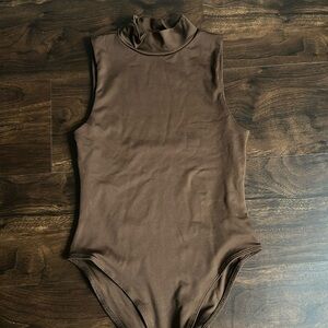 Brown bodysuit